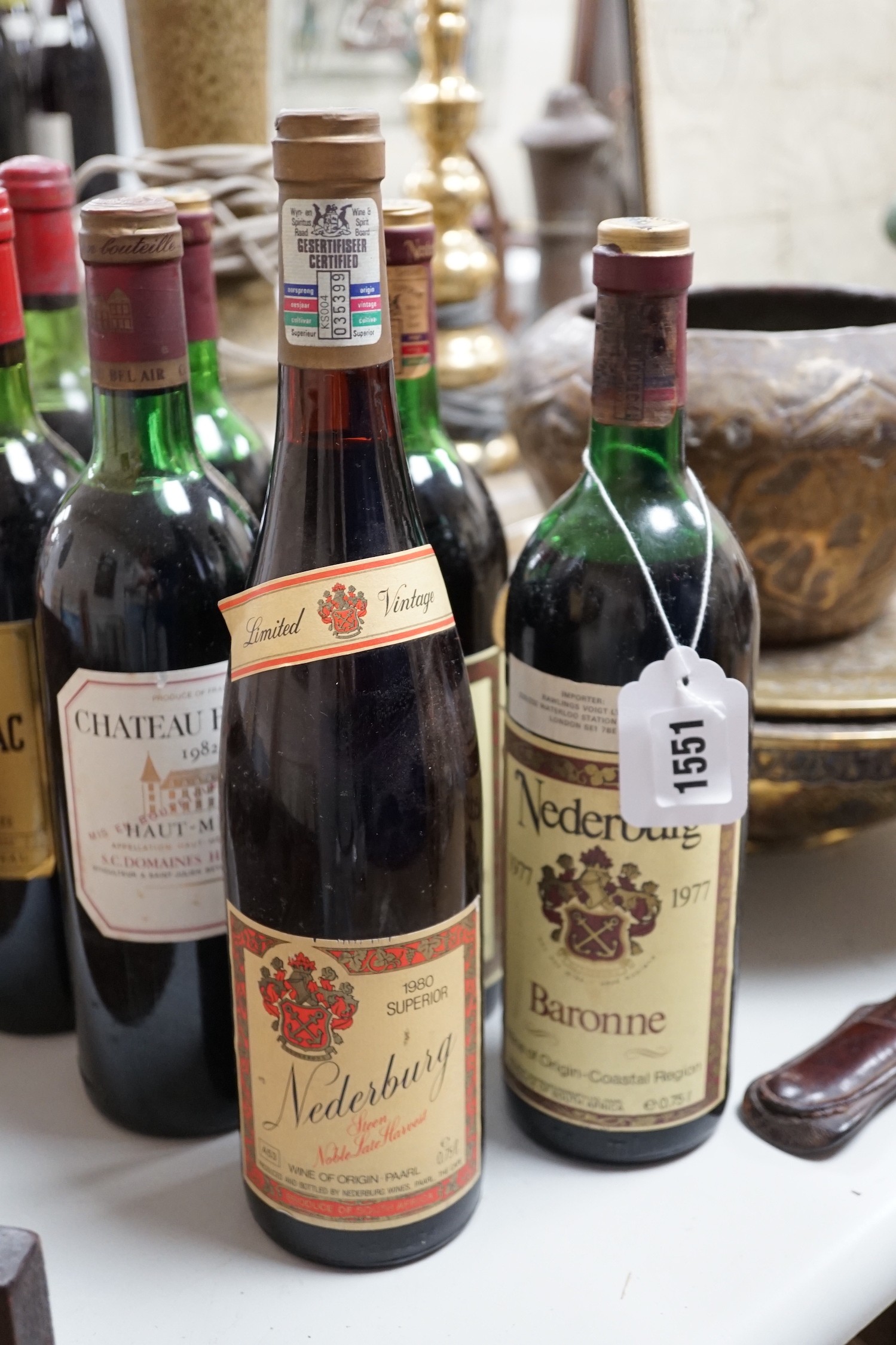 Seven bottles of 75cl 1975 Chateau Brane-Cantenac Margaux, together with a bottle of 75cl 1982 Chateau Bel Air Haut-Medoc and four bottles of 75cl Nederburg; two 1981 Paarl Cabernet Sauvignon, one 1977 Baronne and one bo